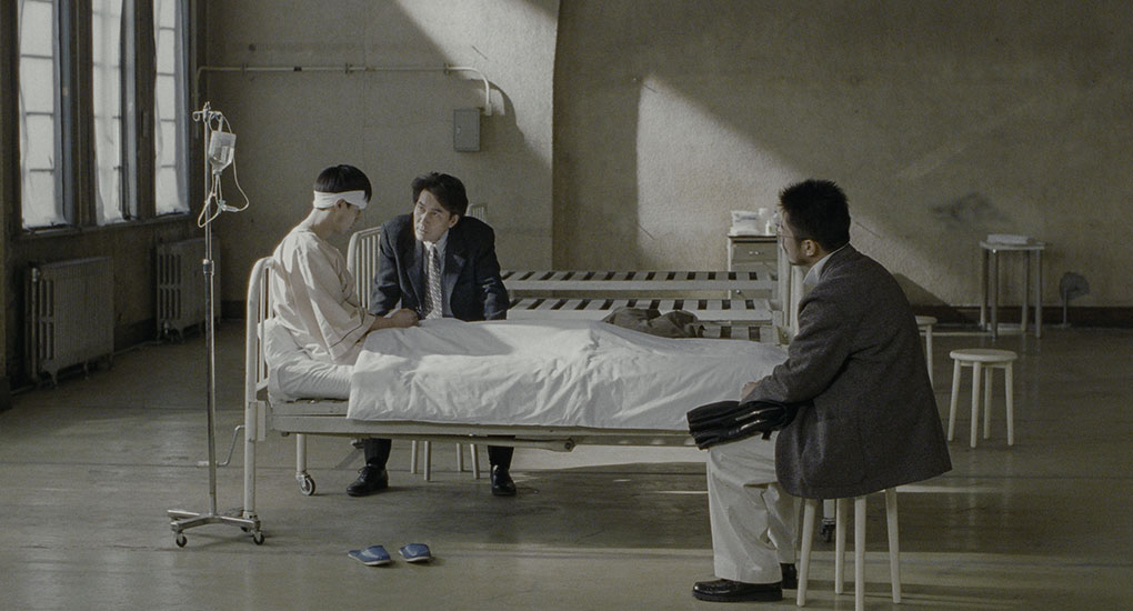 Takabe and Sakuma interview an injured and shaken Hanoka