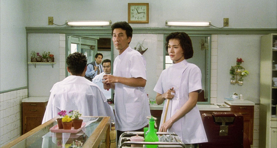 Takuro and Keiko react to the arrival of Dojima