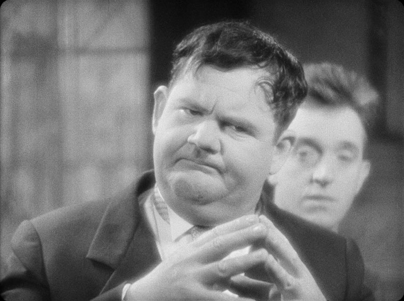 A sublimely framed shot of a guilty Ollie and Stan in We Faw Down