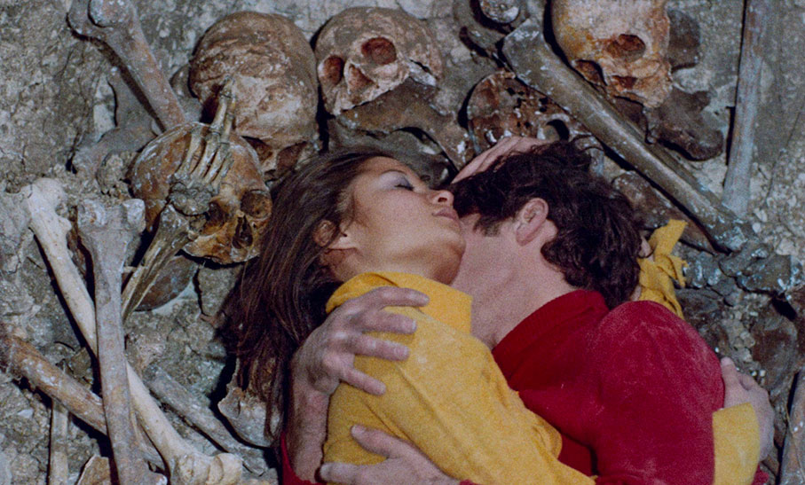 The boy and girl make out in excavated graves