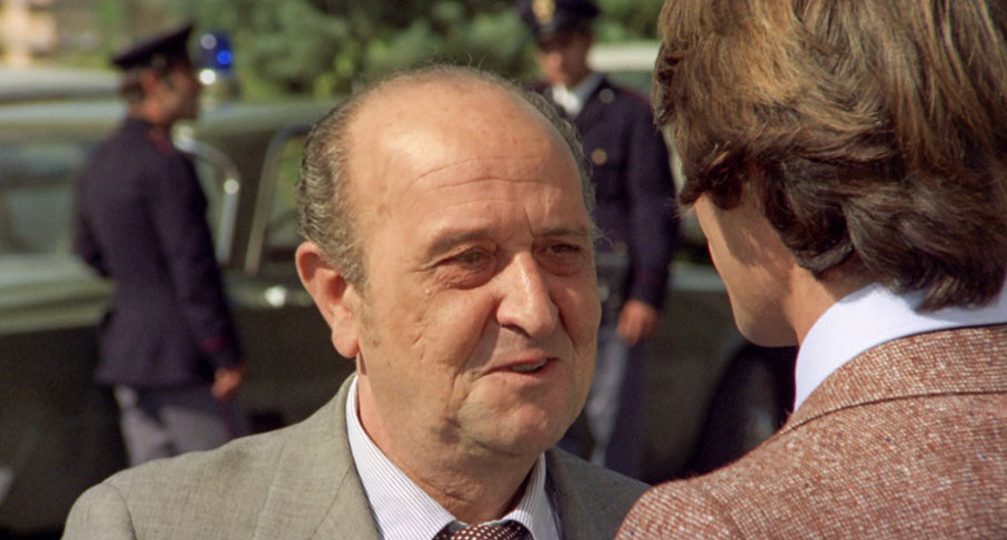 Malcarne is congratulated by his father