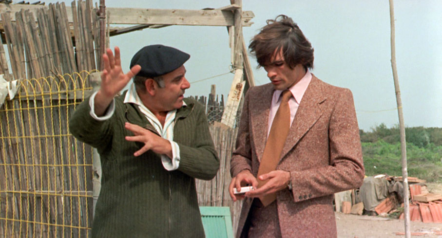 Esposito explains the details of the complaint to Malcarne