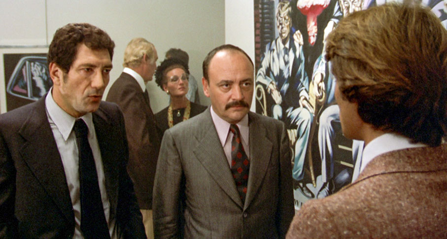 Pascal and his head goon confront Malacarne at Sandra's exhibition