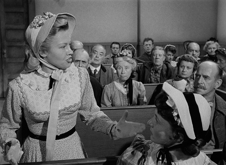 Amy addresses the locals