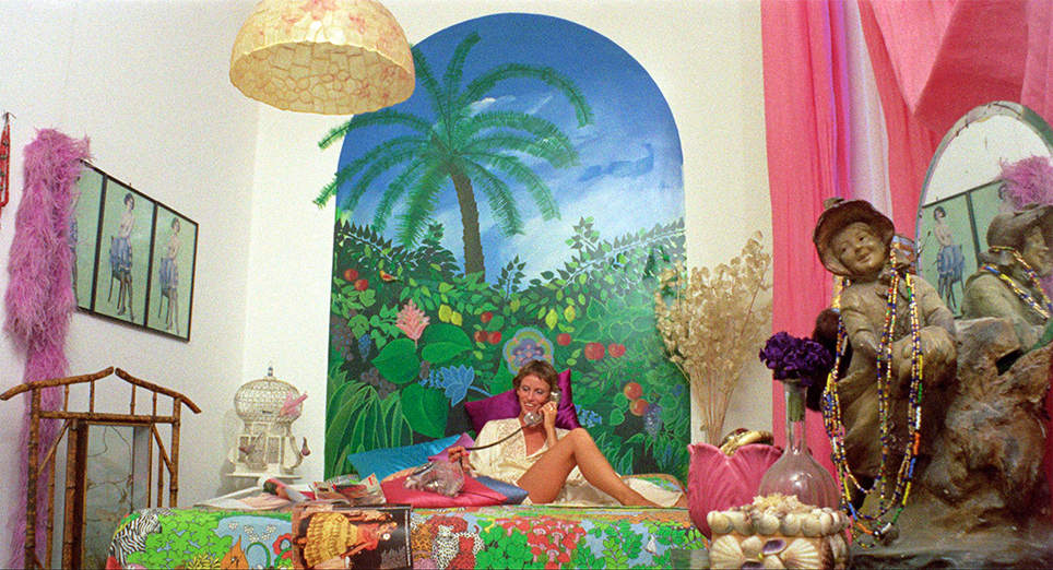 Francesca calls Sylvia from her ornately decorated apartment