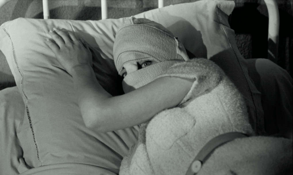 An unwilling donor watches the approach of tormentors