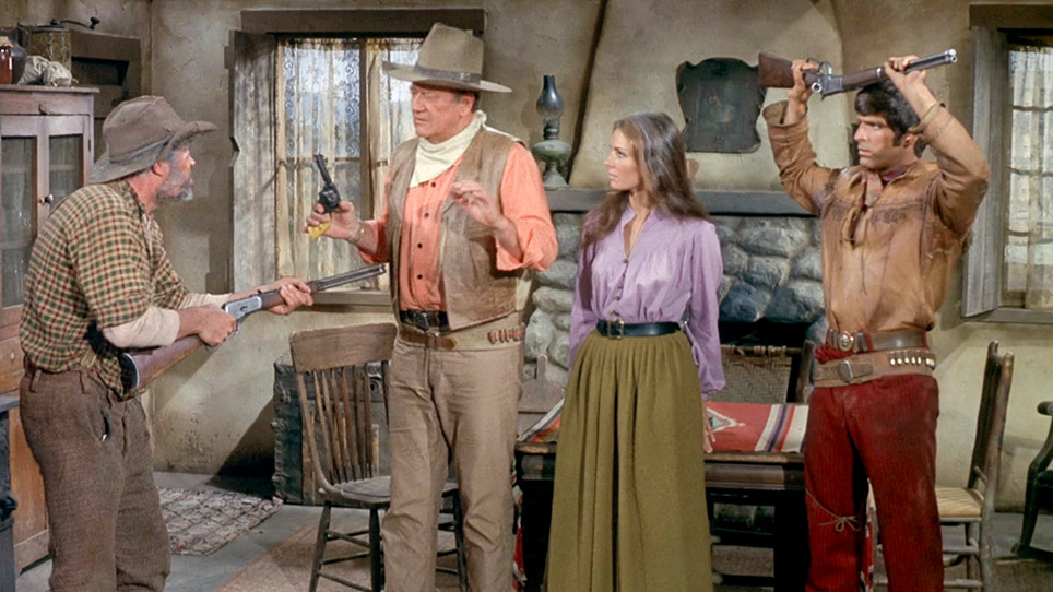 A paranoid Phillips questions Cord, Shasta and Pierre at gunpoint