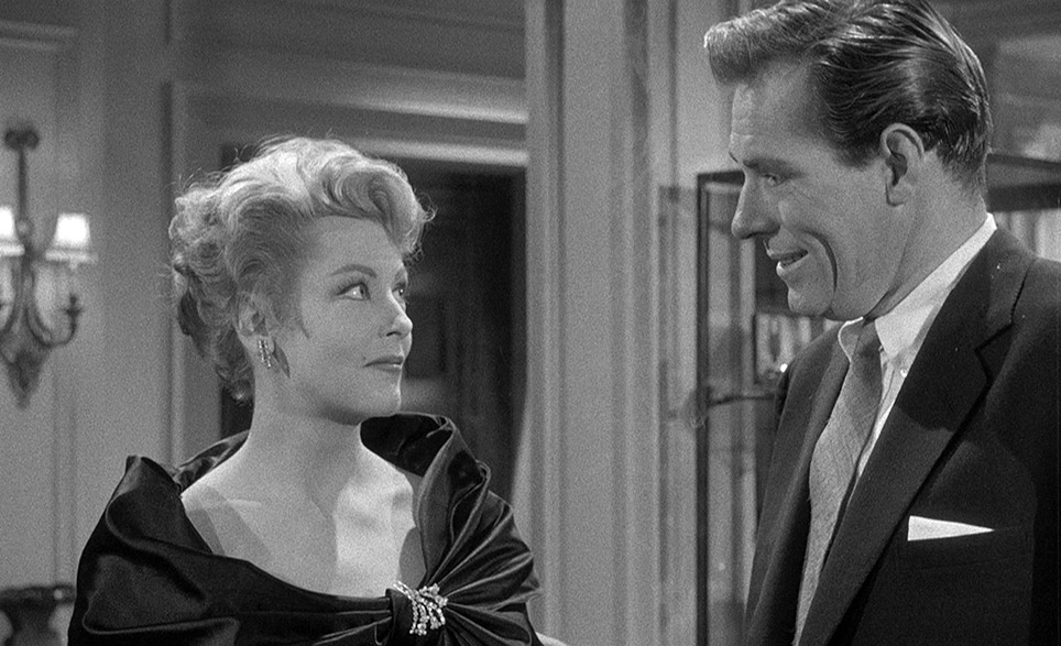 Kathy responds with amusement to Tim's latest advances