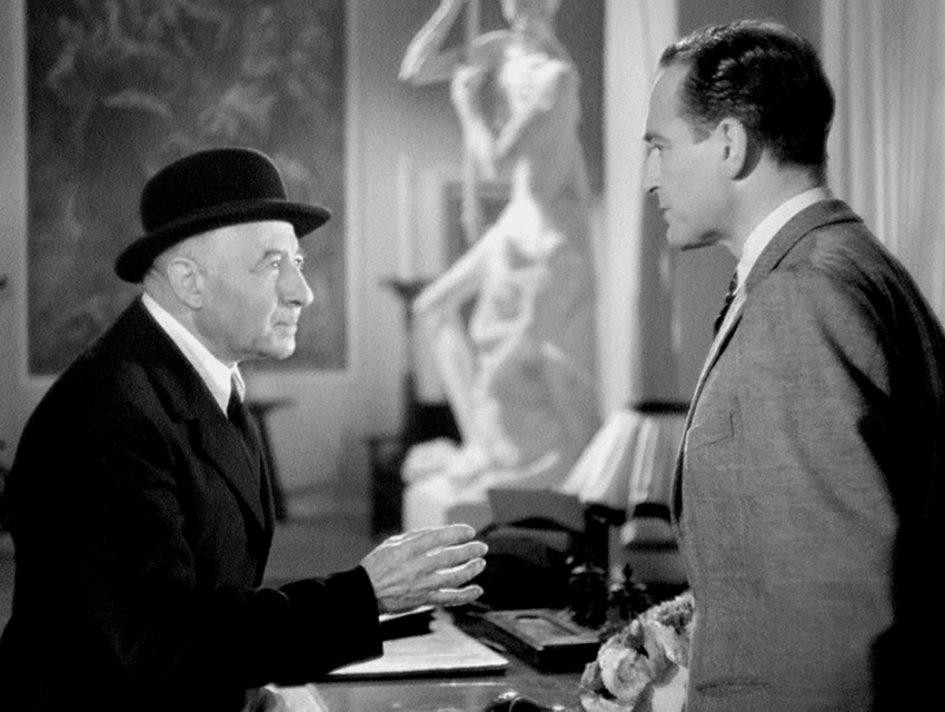 The Little Man explains the reality of his situation to Roland