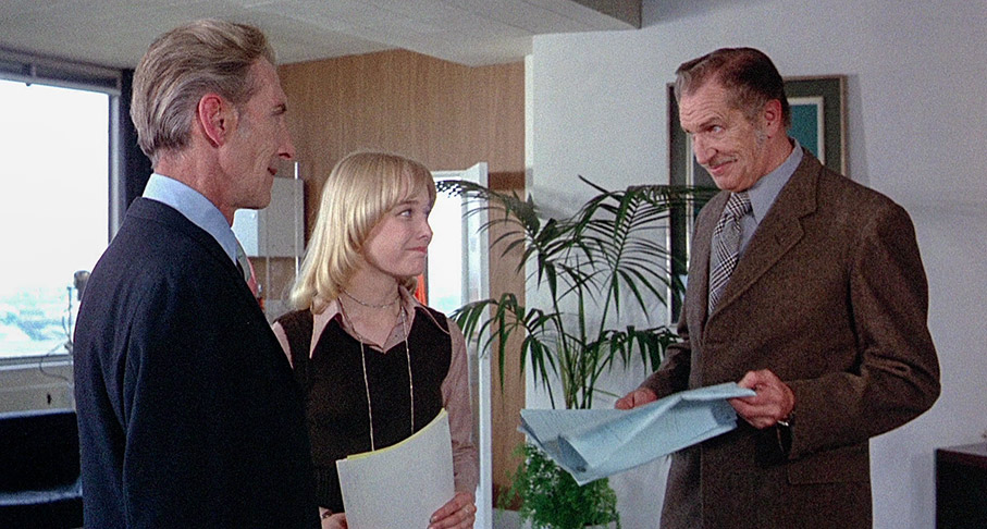 Paul has an agreeable exchange with Herbert and PR rep Julia at the BBC