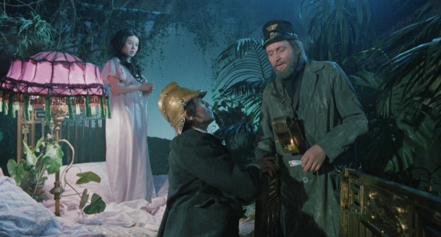 Bianka looks on as Józef appeals to the blind train conductor