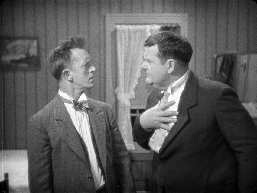 Stan and Ollie start to fall. out in That's My Wife