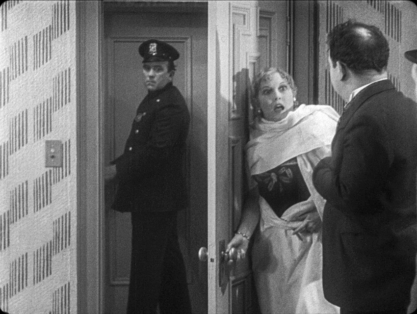 Mrs Keenedy realises her husband is home in Unaccustomed as We Are